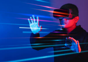 Young man wearing VR goggles. Metaverse technology virtual reality concept. Virtual Reality Device, Simulation, 3D, AR, VR, Innovation and Technology of the Future on Social Media.